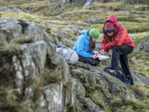 hikers-using-Topographic-map-and-compass