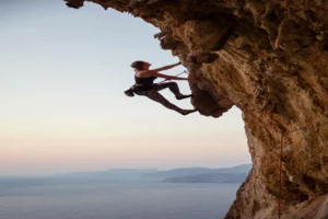 A woman climbing a challenging route-Best climbing ropes
