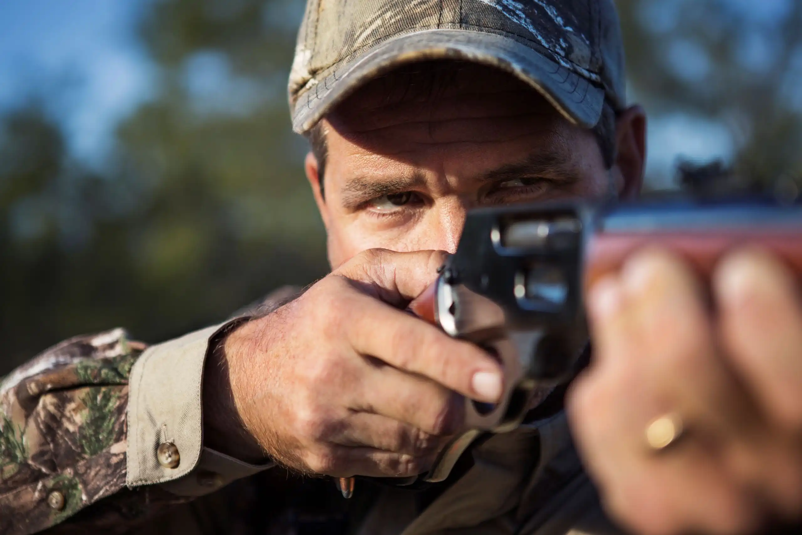 close up of a man hunting-Best hunting rifles