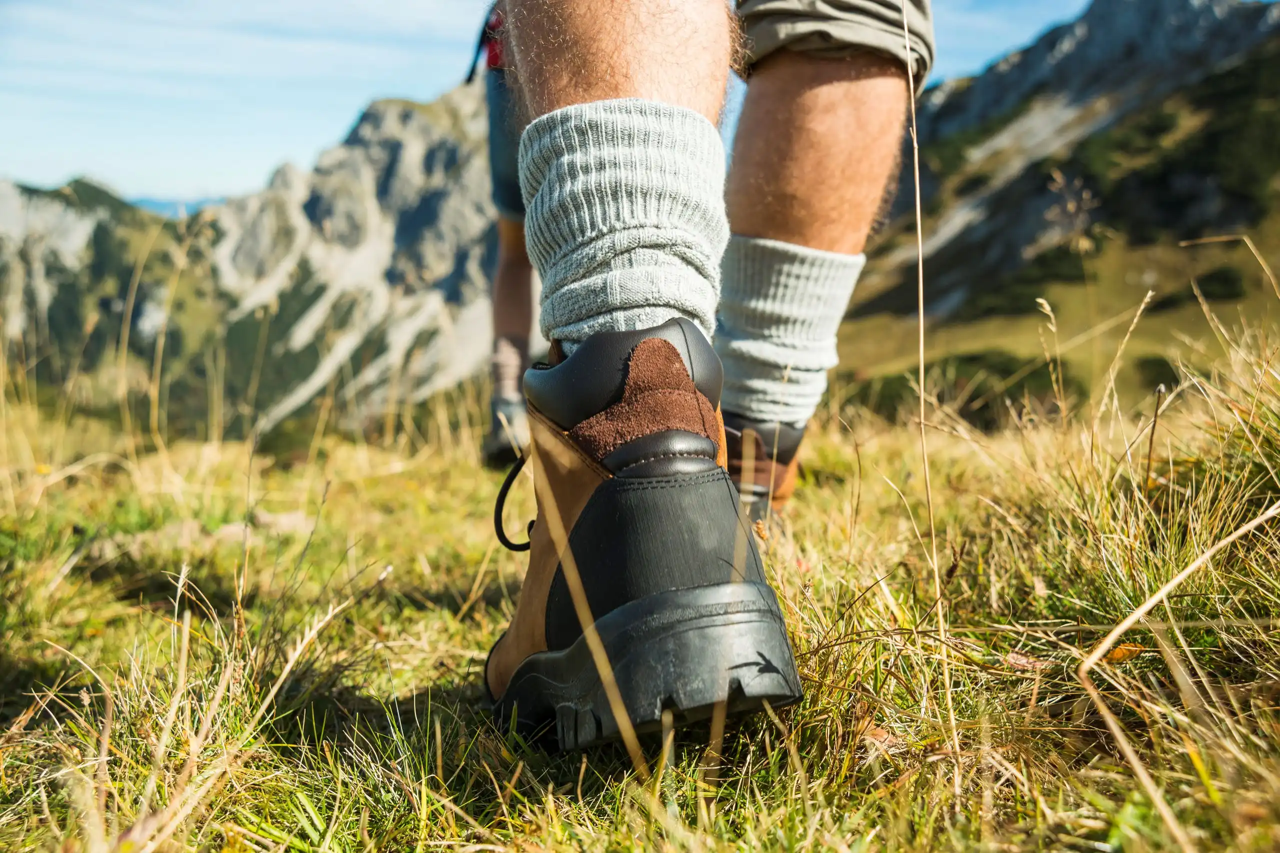 A man hiking with hiking shoes-Best Oboz hiking shoes