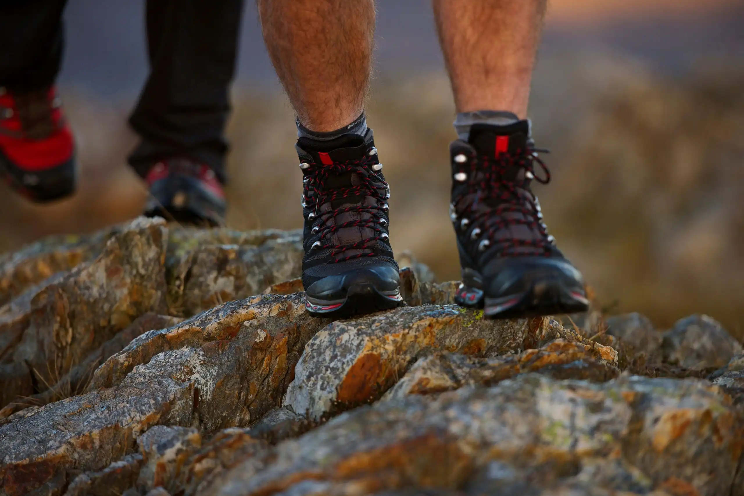 close up of hiking boots on mountainside-Best merrell hiking boots