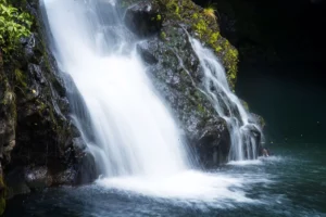 waterfall on the road to hana in maui hawaii